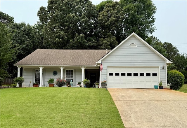1552 Longwood Dr, Lawrenceville, GA 30043 - ranch-style house with an attached garage, concrete driveway, covered porch, and a front yard