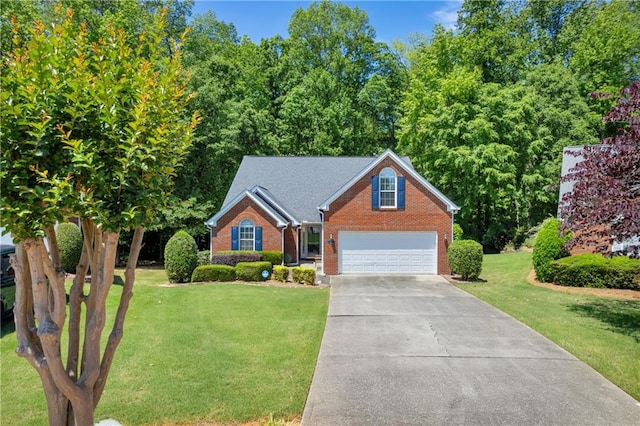 view of front of house with brick siding, concrete driveway, a front yard, and an attached garage