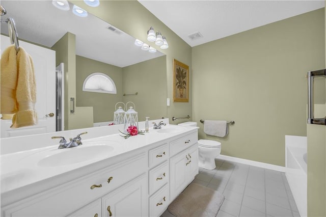 bathroom with a bath, baseboards, toilet, tile patterned flooring, and double vanity
