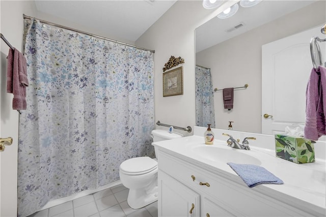 bathroom featuring tile patterned floors, vanity, toilet, and curtained shower