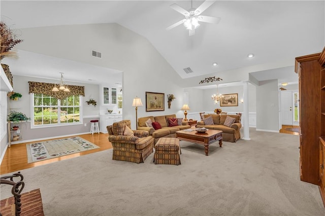 living area featuring a chandelier, high vaulted ceiling, a ceiling fan, recessed lighting, and baseboards