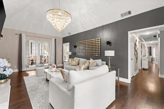 living room with high vaulted ceiling, dark wood-type flooring, and a chandelier