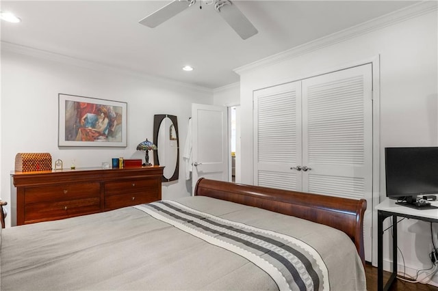 bedroom featuring ceiling fan, a closet, wood-type flooring, and ornamental molding