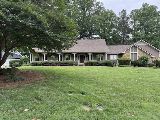 12162 Mountain Laurel Dr, Roswell, GA 30075 - view of front of home with stone siding and a front lawn