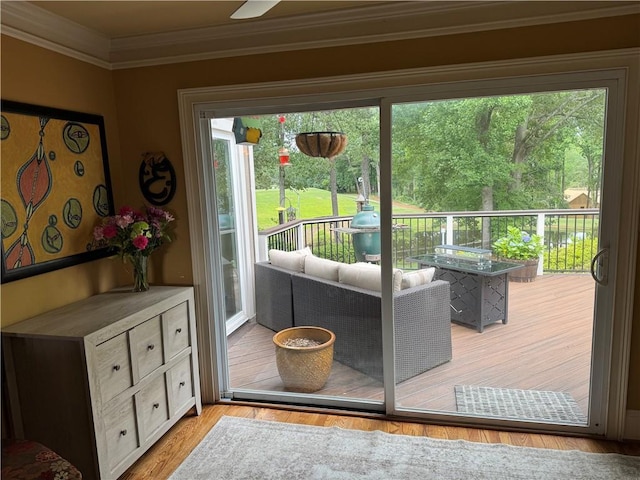 12162 Mountain Laurel Dr, Roswell, GA 30075 - doorway to outside with plenty of natural light, crown molding, and light wood-style flooring