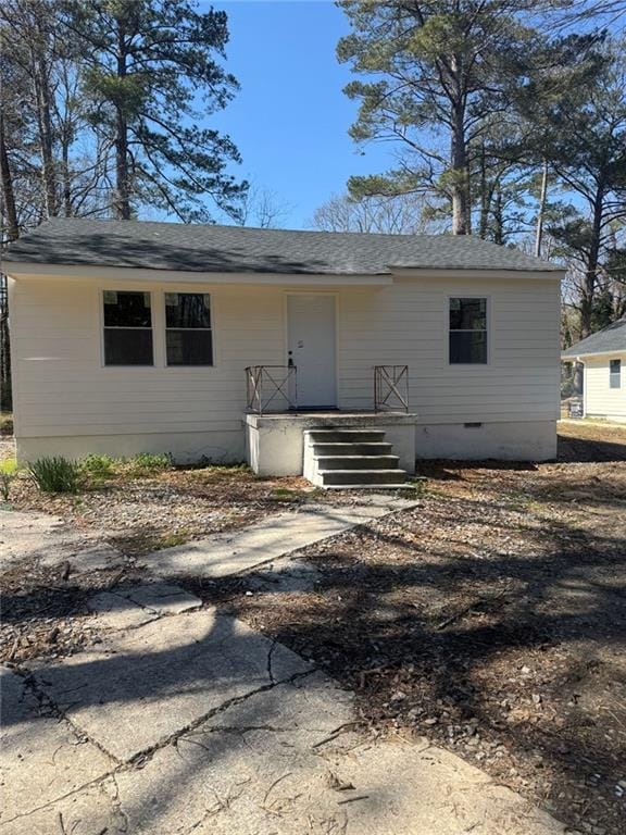 view of front of house with covered porch and crawl space