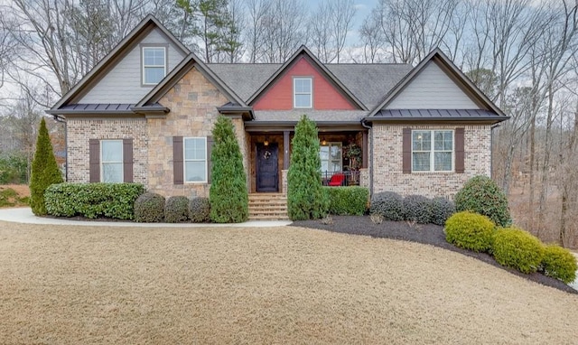 craftsman-style house featuring covered porch