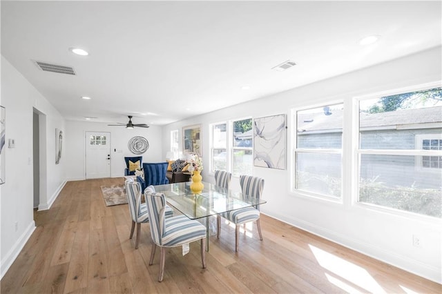 dining room featuring ceiling fan and light hardwood / wood-style floors