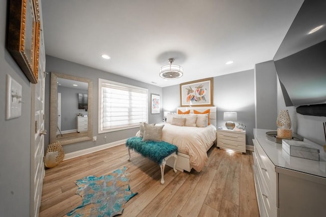 bedroom with light hardwood / wood-style flooring