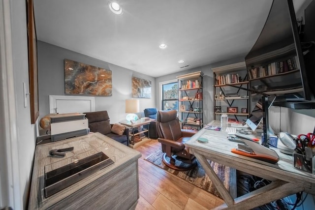 home office featuring hardwood / wood-style floors