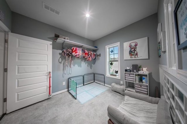 gym with lofted ceiling and carpet