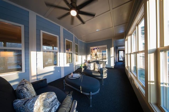 rear view of property featuring a fenced in pool, a patio, and an outdoor living space