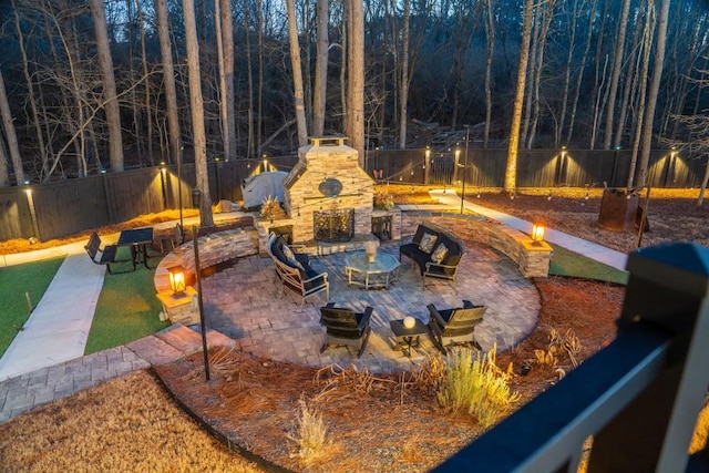 view of patio / terrace featuring a fireplace