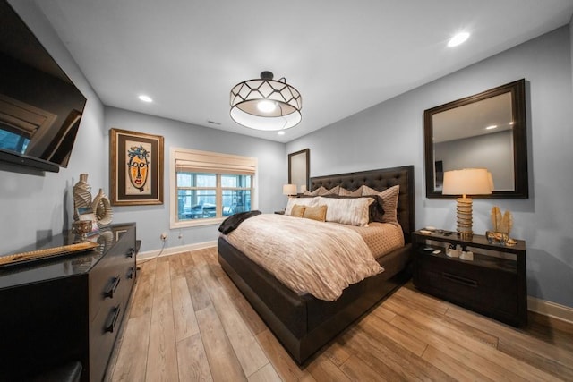 bedroom featuring light wood-type flooring