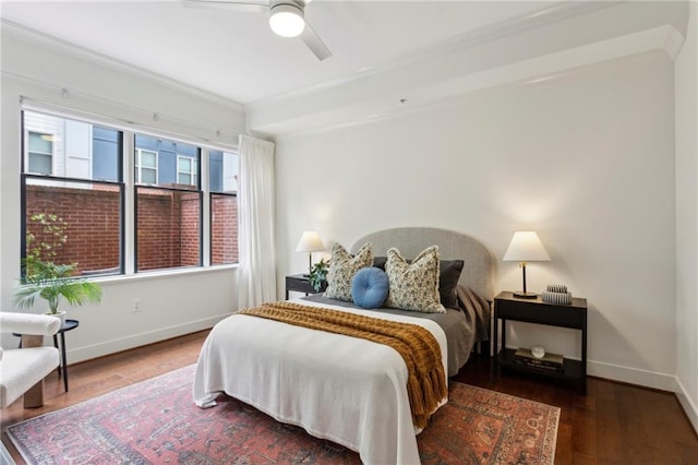 bedroom with wood finished floors, baseboards, and ceiling fan