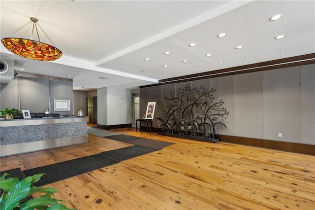 reception featuring recessed lighting