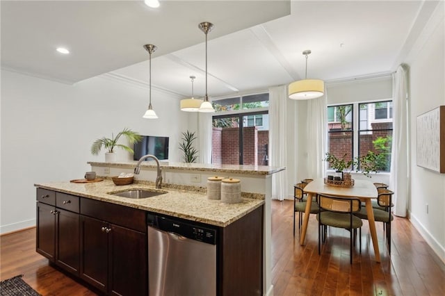 kitchen featuring stainless steel dishwasher, a sink, dark wood-style floors, hanging light fixtures, and dark brown cabinetry