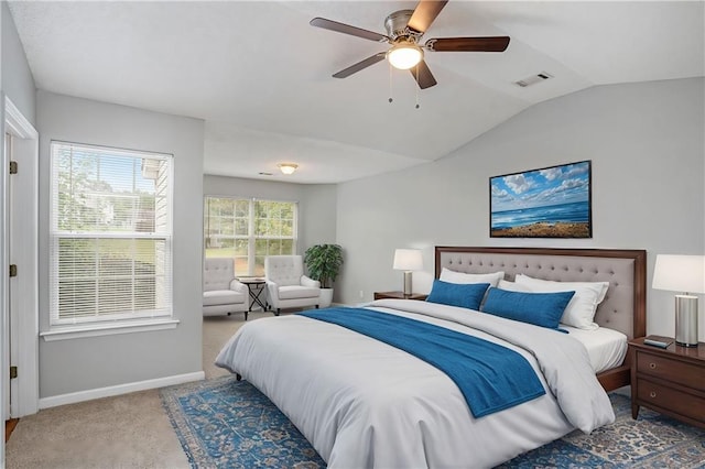 bedroom with lofted ceiling, ceiling fan, and carpet floors