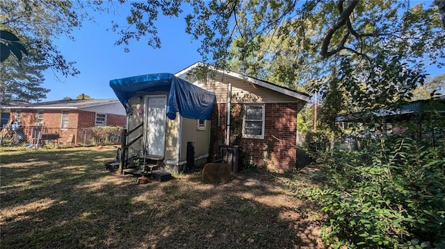 exterior space featuring a yard