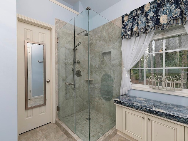 bathroom featuring a shower stall
