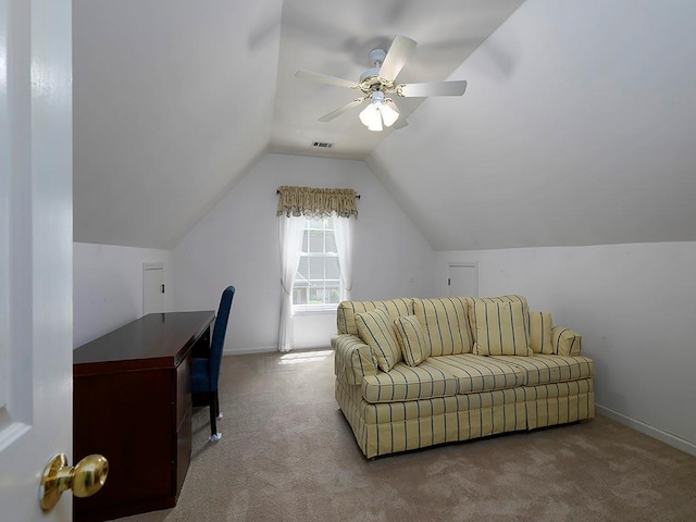 office space featuring carpet flooring, visible vents, lofted ceiling, and baseboards