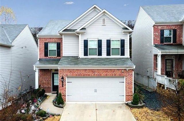 view of front of property with a garage