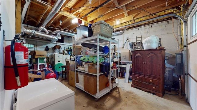 basement featuring refrigerator