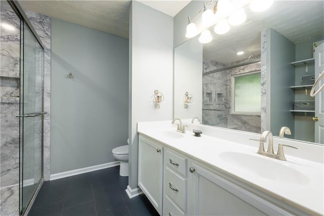5279 Leecroft Dr, Buford, GA 30518 - full bath featuring a stall shower, double vanity, tile patterned floors, and a textured ceiling