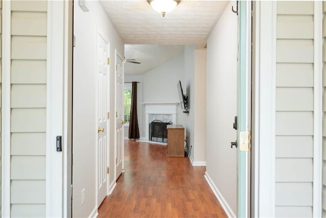 5279 Leecroft Dr, Buford, GA 30518 - hall featuring dark wood finished floors and a textured ceiling