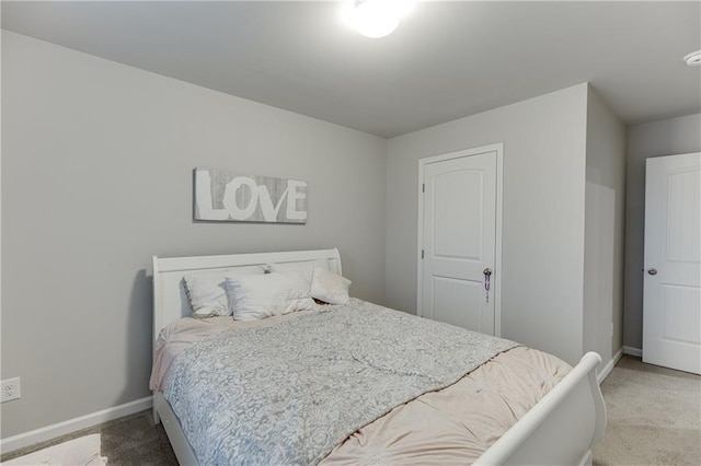 bedroom featuring carpet flooring