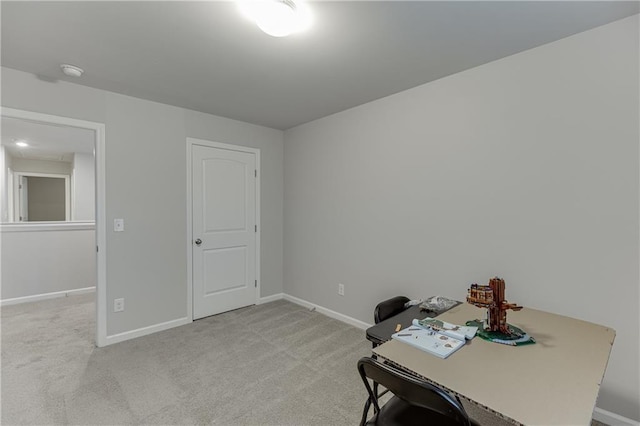 interior space featuring light colored carpet