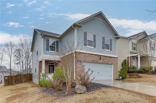 view of front of property with a garage