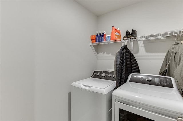 laundry area with washer and dryer