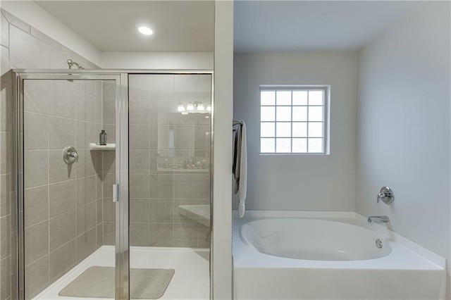 bathroom featuring plus walk in shower