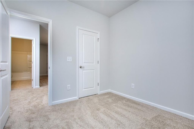 115 Greenview Ct, Homer, GA 30547 - unfurnished bedroom featuring carpet flooring and baseboards
