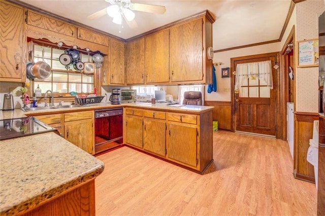 kitchen with ceiling fan, light hardwood / wood-style floors, dishwasher, and ornamental molding