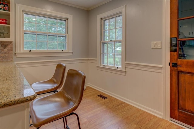 500 Cochran Rd, Covington, GA 30014 - office space with wainscoting, healthy amount of natural light, light wood-style floors, and crown molding