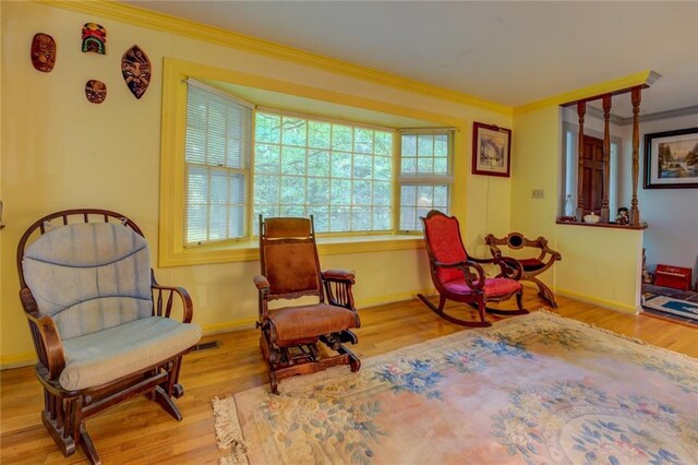 500 Cochran Rd, Covington, GA 30014 - living area with crown molding, wood finished floors, and baseboards