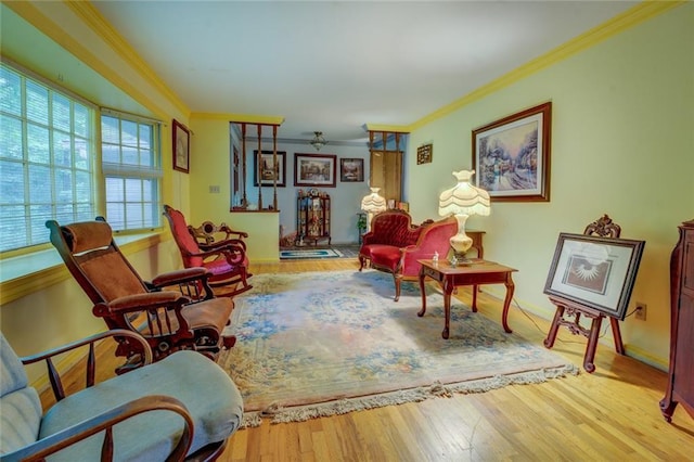 500 Cochran Rd, Covington, GA 30014 - sitting room featuring crown molding, wood finished floors, ceiling fan, and baseboards