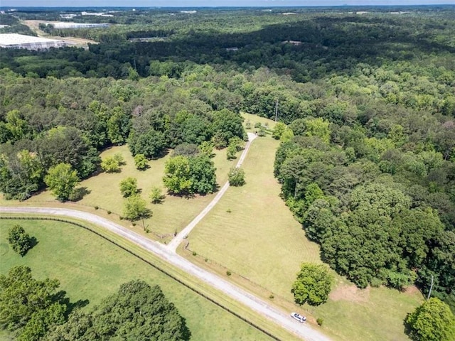 bird's eye view featuring a rural view and a view of trees