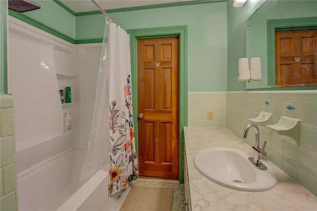 500 Cochran Rd, Covington, GA 30014 - bathroom with vanity, shower / bath combo with shower curtain, and wainscoting