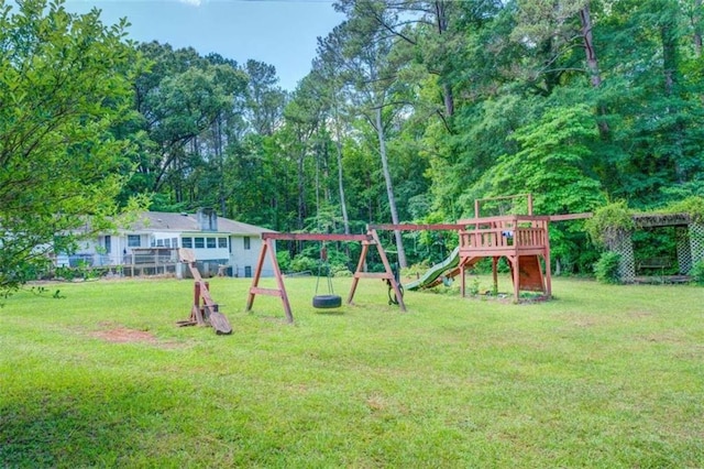 view of play area with a yard