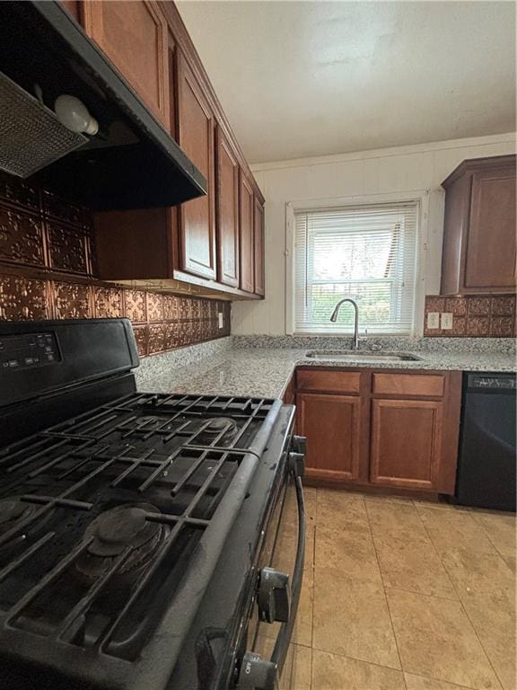 2069 Bixler Cir, Decatur, GA 30032 - kitchen featuring a sink, decorative backsplash, light tile patterned floors, under cabinet range hood, and black appliances