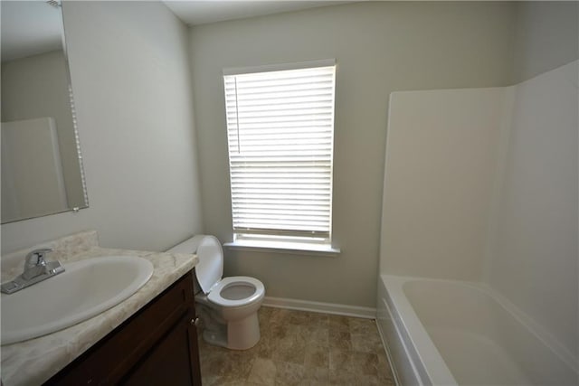 full bathroom with shower / bathing tub combination, vanity, and toilet