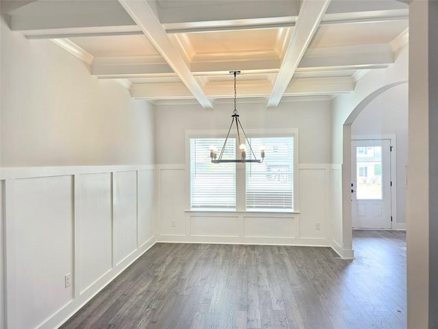 195 Silvercrest Dr, Acworth, GA 30101 - unfurnished dining area with coffered ceiling, a decorative wall, dark wood-style floors, arched walkways, and beam ceiling