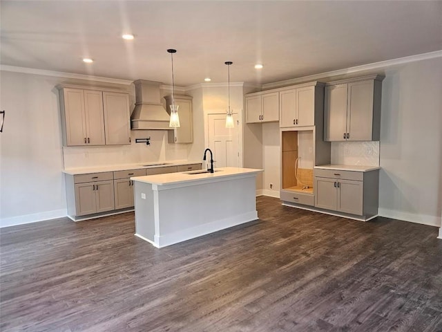 195 Silvercrest Dr, Acworth, GA 30101 - kitchen with gray cabinets, a sink, custom exhaust hood, baseboards, and crown molding