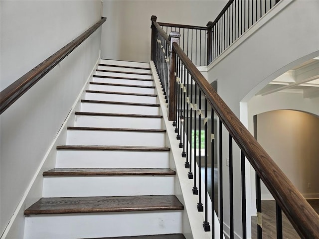 195 Silvercrest Dr, Acworth, GA 30101 - staircase with arched walkways and a towering ceiling