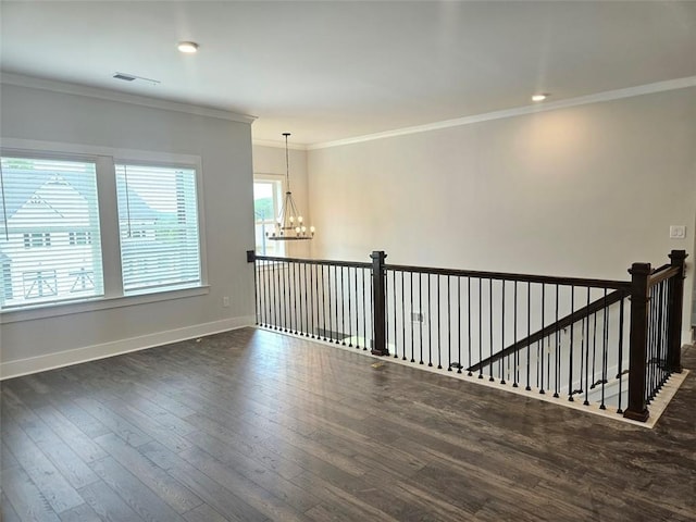 195 Silvercrest Dr, Acworth, GA 30101 - unfurnished room with a chandelier, wood-type flooring, baseboards, and ornamental molding