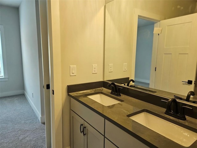 195 Silvercrest Dr, Acworth, GA 30101 - bathroom featuring baseboards and double vanity