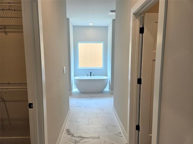 195 Silvercrest Dr, Acworth, GA 30101 - hallway with light marble finish floors and baseboards